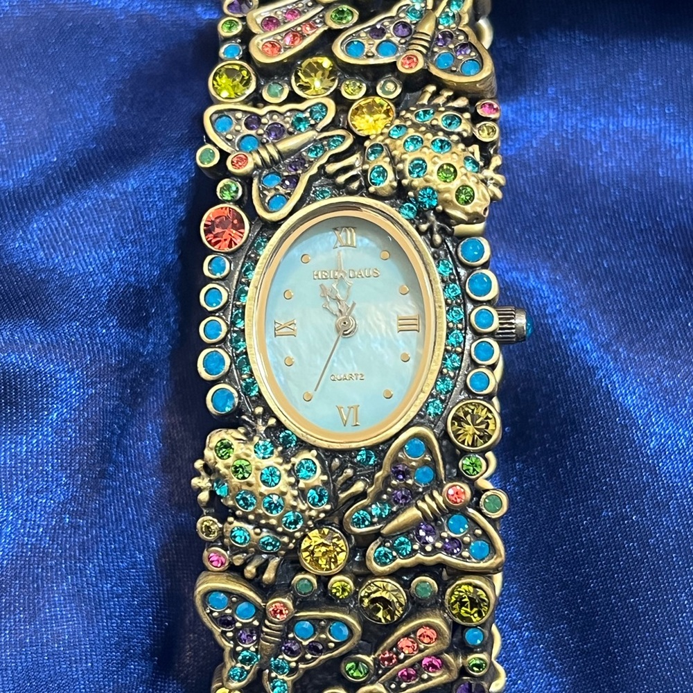 Heidi Daus, Bracelet Geneva Quartz Watch with Butterfly Design.